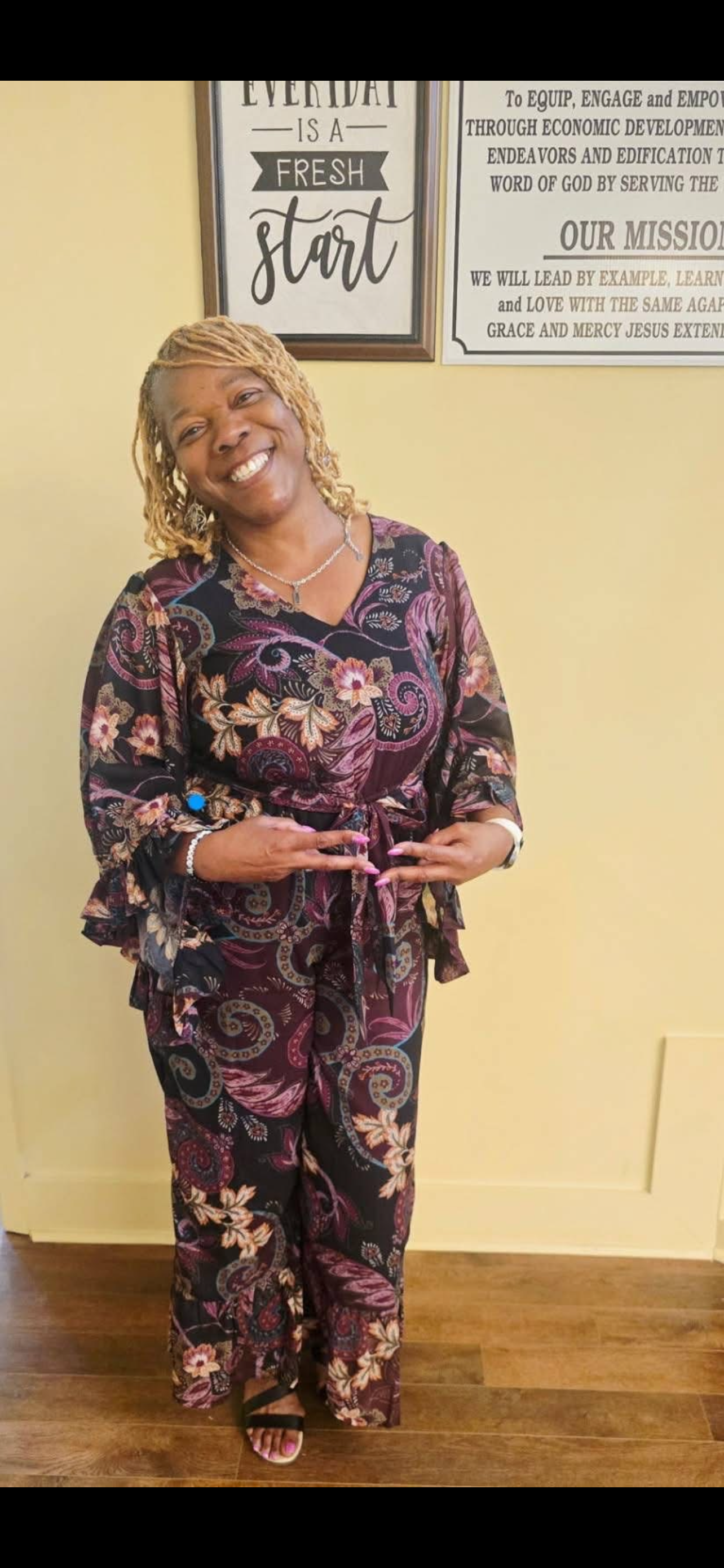 Fresh Start Variety Shop owner wearing the beautiful items from her shop