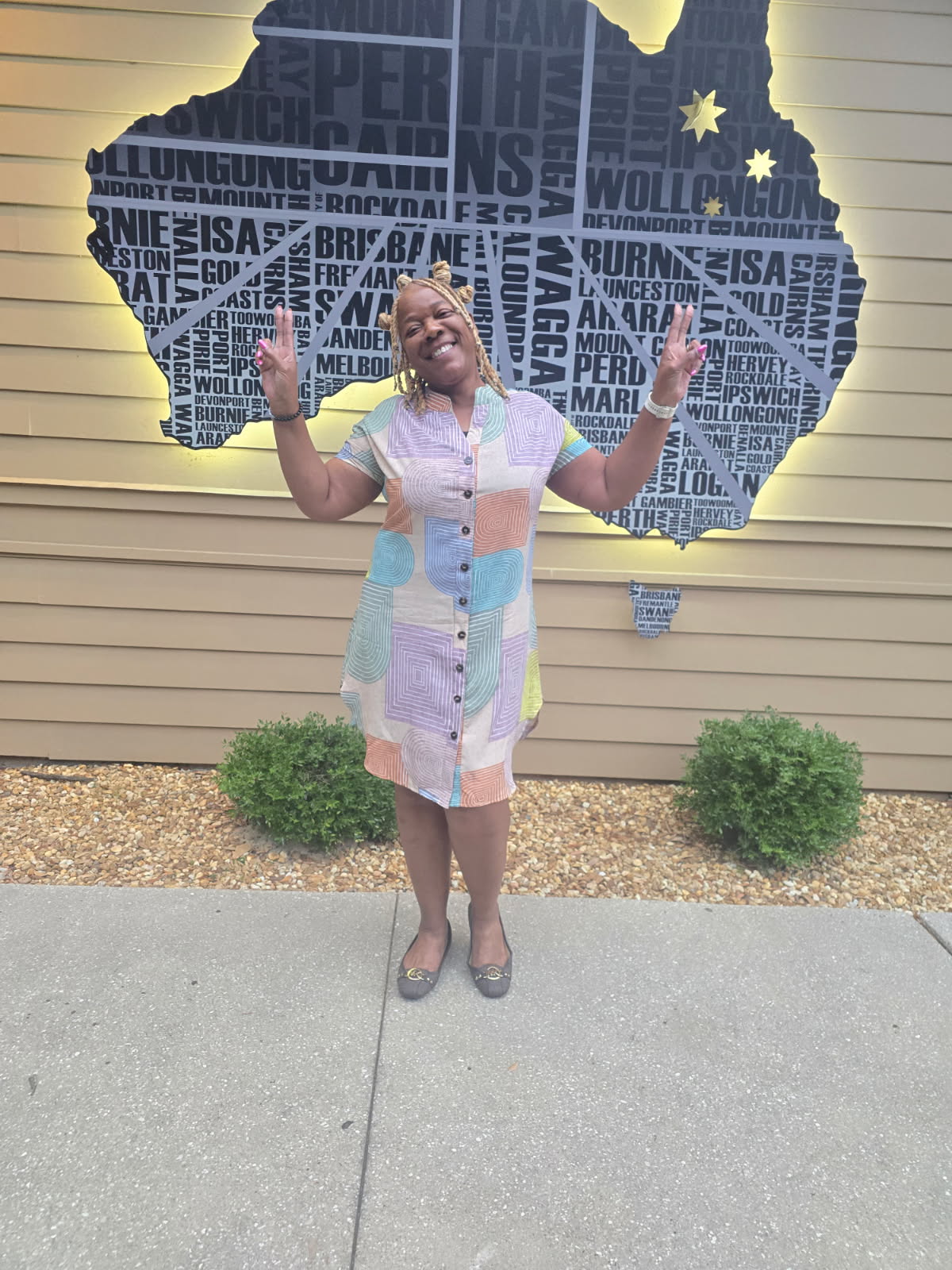 Apostle Annette Higdon owner of FSVS is wearing multi color dress