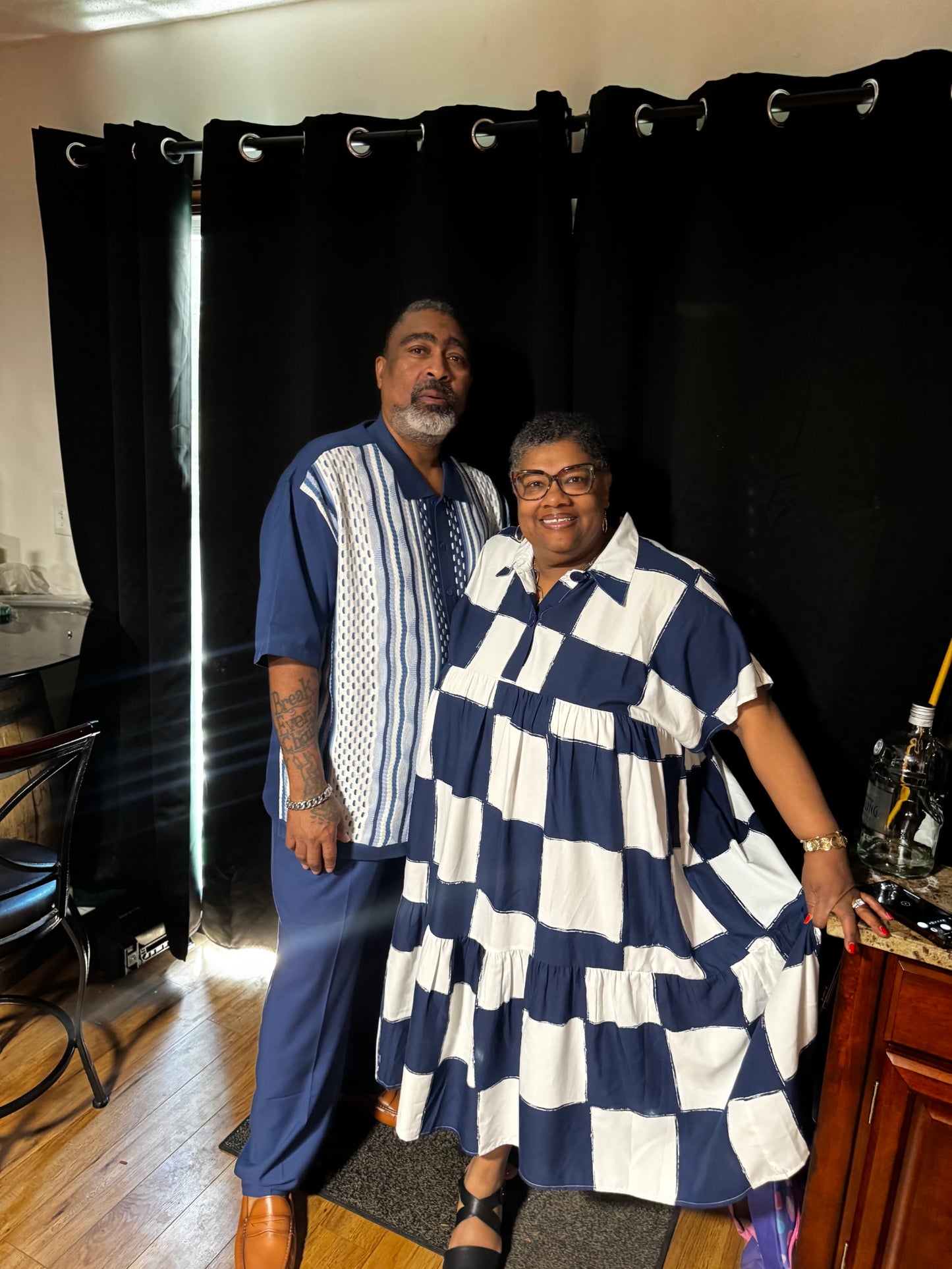 Beautiful navy and white checkered plus-sized dress. We have this item in store.